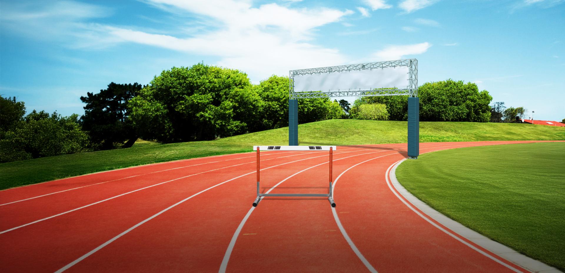 Track with hurdle ahead of finish line